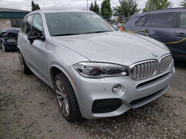Photo 9 from auction – 2015 BMW X5 XDRIVE5 with VIN 5UXKR6C58F0J78609