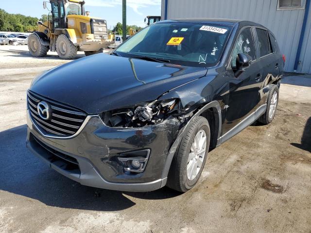 Photo 2 from auction – 2016 MAZDA CX-5 TOURI with VIN JM3KE2CY9G0867759