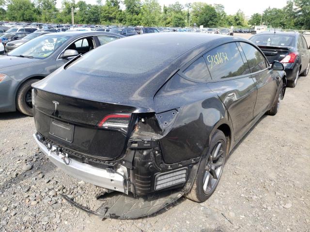 Photo 4 from auction – 2021 TESLA MODEL 3 with VIN 5YJ3E1EA4MF859329