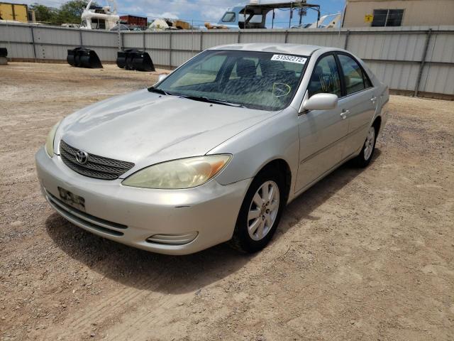 Photo 2 from auction – 2002 TOYOTA CAMRY LE with VIN JTDBE30K820120497