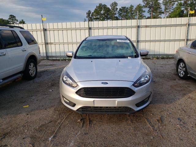 Photo 9 from auction – 2018 FORD FOCUS SE with VIN 1FADP3FE7JL219867