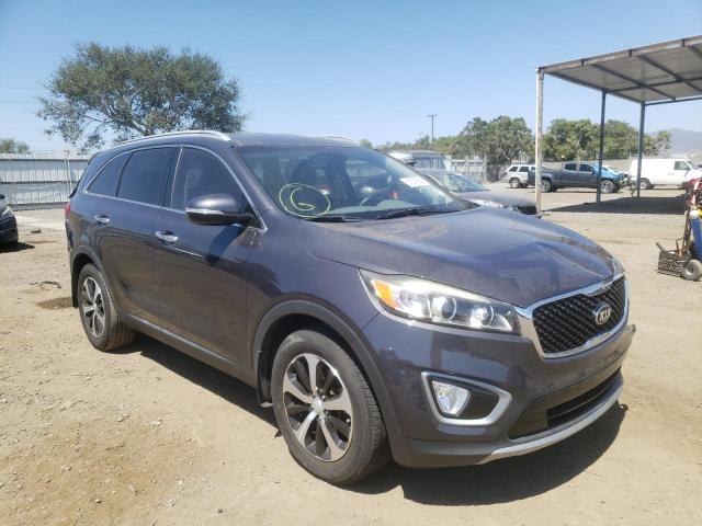 KIA SORENTO EX 2016 with VIN 5XYPH4A19GG015879 - Photo from auction