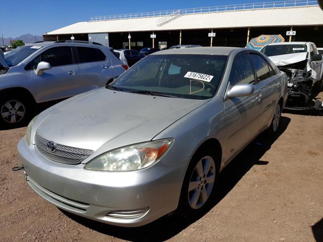 Photo 2 from auction – 2002 TOYOTA CAMRY LE with VIN JTDBE32K320071030
