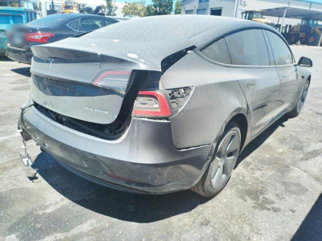 Photo 4 from auction – 2021 TESLA MODEL 3 with VIN 5YJ3E1EBXMF070899