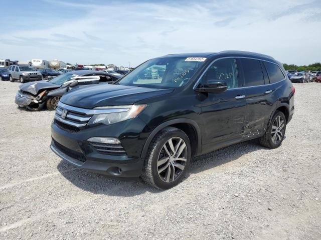Photo 2 from auction – 2016 HONDA PILOT TOUR with VIN 5FNYF5H98GB034720