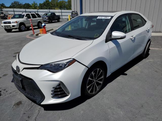 Photo 2 from auction – 2017 TOYOTA COROLLA L with VIN 5YFBURHE3HP610249