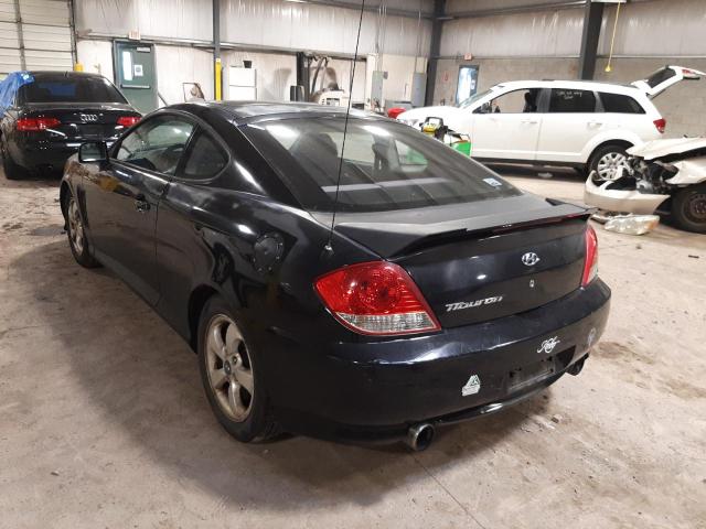 Photo 3 from auction – 2005 HYUNDAI TIBURON with VIN KMHHM65D75U155131