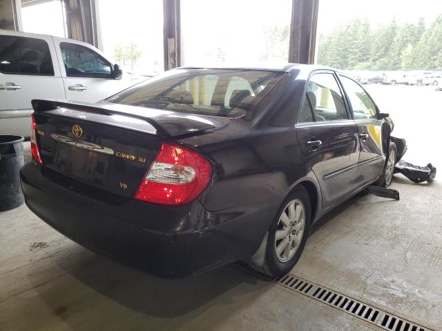 Photo 4 from auction – 2002 TOYOTA CAMRY LE with VIN JTDBF30K320044054