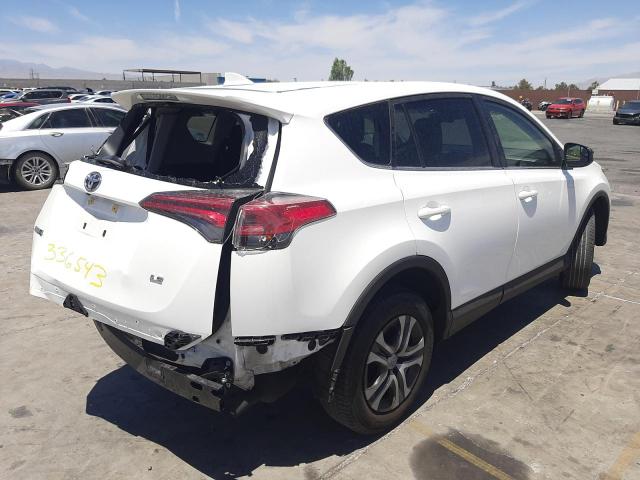 Photo 4 from auction – 2018 TOYOTA RAV4 LE with VIN JTMZFREV1JJ210441