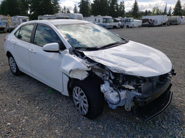 TOYOTA COROLLA L 2019 with VIN 5YFBURHE4KP879058 - Photo from auction