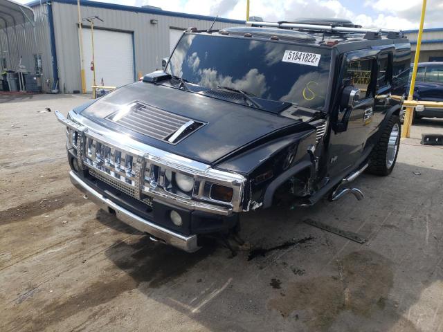Photo 2 from auction – 2003 HUMMER H2 with VIN 5GRGN23U63H104720