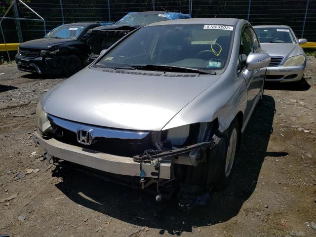 Photo 2 from auction – 2006 HONDA CIVIC HYBR with VIN JHMFA36236S030817