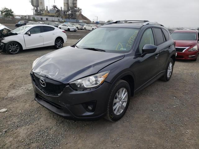 Photo 2 from auction – 2014 MAZDA CX-5 TOURI with VIN JM3KE2CY0E0370998