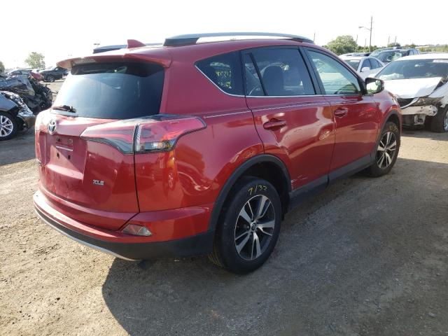 Photo 4 from auction – 2017 TOYOTA RAV4 XLE with VIN JTMWFREV7HJ138710
