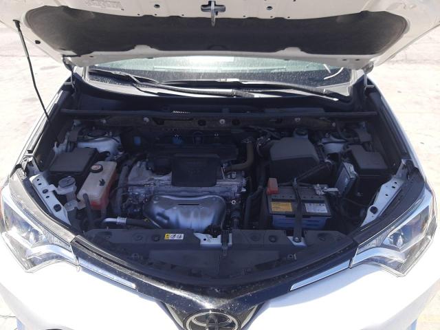 Photo 7 from auction – 2018 TOYOTA RAV4 LE with VIN JTMZFREV1JJ210441