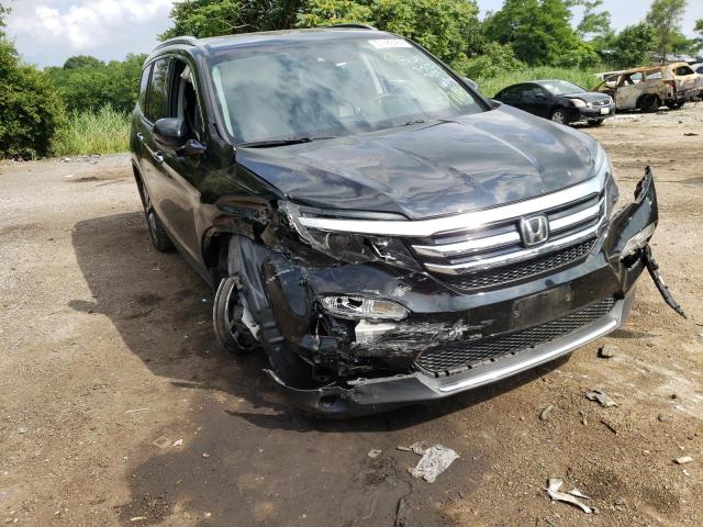 HONDA PILOT ELIT 2018 with VIN 5FNYF6H05JB007439 - Photo from auction
