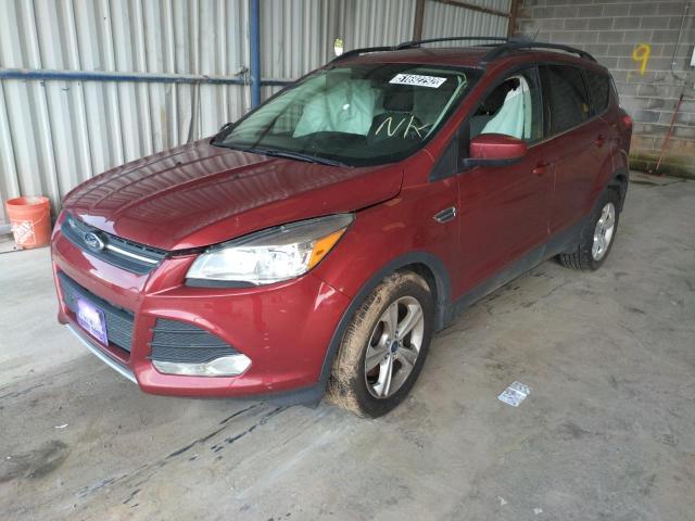 Photo 2 from auction – 2016 FORD ESCAPE SE with VIN 1FMCU9GX2GUB86180