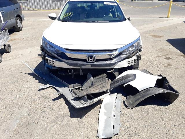 Photo 10 from auction – 2018 HONDA CIVIC LX with VIN 19XFC2F51JE203052
