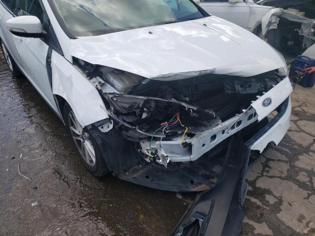 Photo 9 from auction – 2017 FORD FOCUS SE with VIN 1FADP3K20HL319878