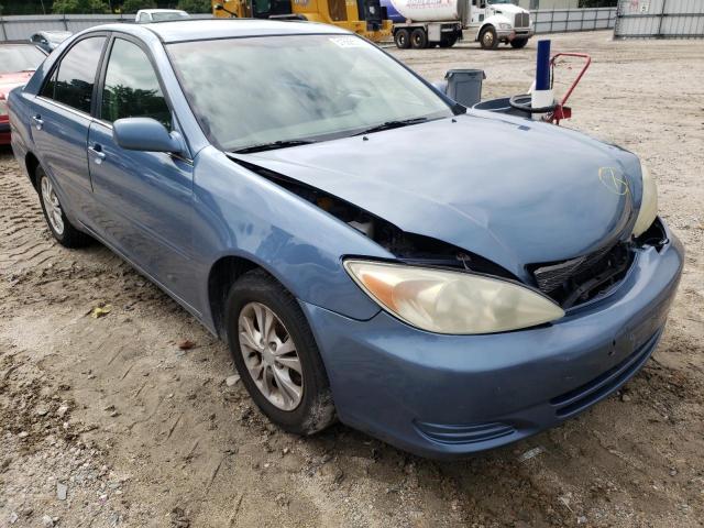 TOYOTA CAMRY LE 2004 with VIN 4T1BF30K94U572771 - Photo from auction