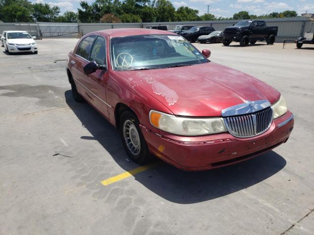 LINCOLN TOWN CAR E 2000 with VIN 1LNHM81W1YY938929 - Photo from auction