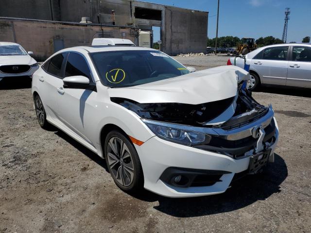 HONDA CIVIC EX 2018 with VIN JHMFC1F30JX022564 - Photo from auction