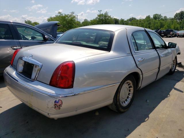 Photo 4 from auction – 2001 LINCOLN TOWN CAR E with VIN 1LNHM81W21Y672357