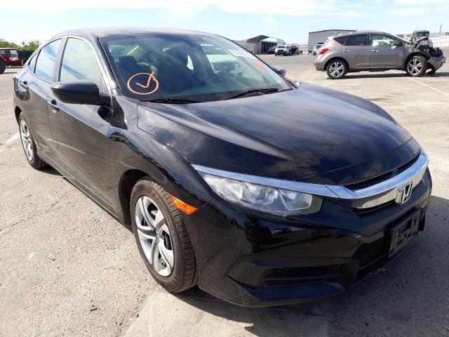 HONDA CIVIC LX 2018 with VIN 2HGFC2F52JH523857 - Photo from auction