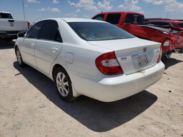 Photo 3 from auction – 2004 TOYOTA CAMRY LE with VIN JTDBE32K940282574