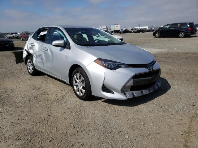 TOYOTA COROLLA L 2019 with VIN 5YFBURHE4KP897317 - Photo from auction