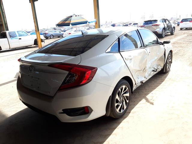 Photo 4 from auction – 2018 HONDA CIVIC EX with VIN 19XFC2F7XJE012568