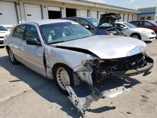 LINCOLN TOWN CAR E 2001 with VIN 1LNHM81W21Y672357 - Photo from auction