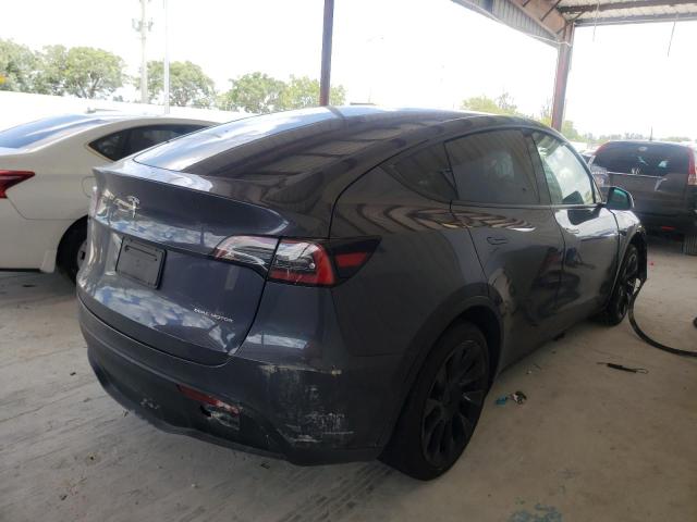 Photo 4 from auction – 2021 TESLA MODEL Y with VIN 5YJYGDEE3MF191561