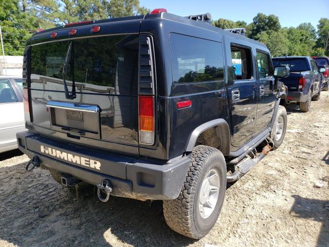 Фото 4 с аукциона – 2003 HUMMER H2 с VIN 5GRGN23U63H127849
