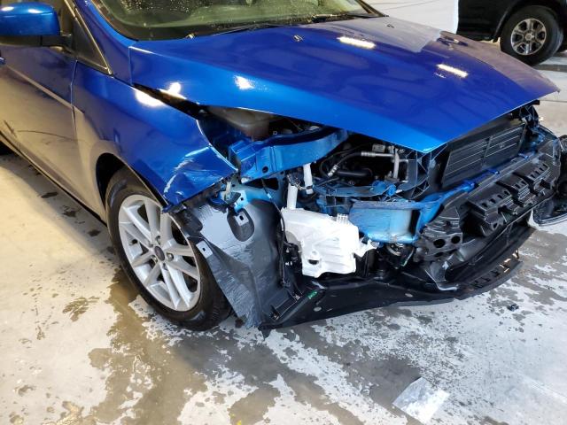 Photo 9 from auction – 2018 FORD FOCUS SE with VIN 1FADP3F23JL231505