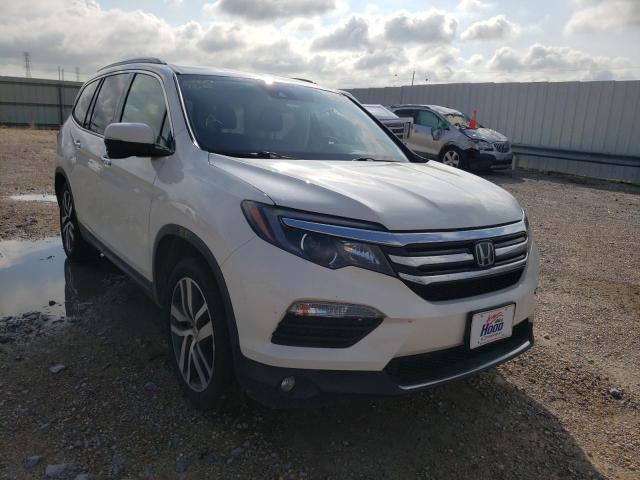 Photo 1 from auction – 2017 HONDA PILOT TOUR with VIN 5FNYF5H98HB046285