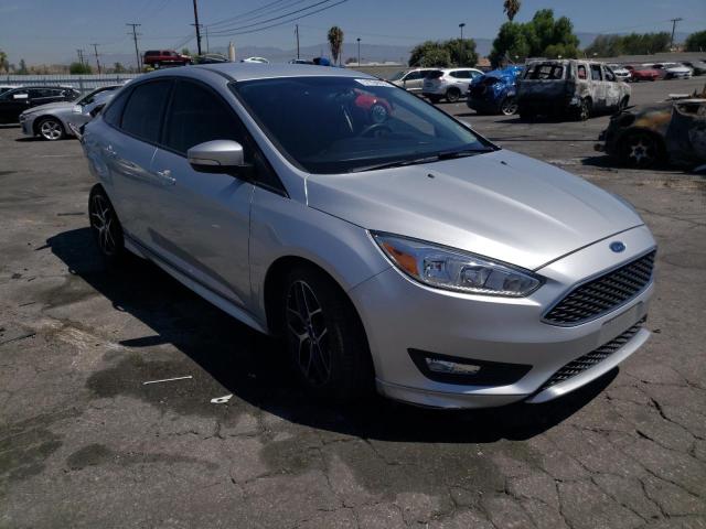 FORD FOCUS SE 2016 with VIN 1FADP3F27GL301595 - Photo from auction