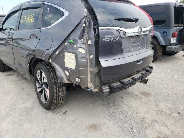 Photo 9 from auction – 2015 HONDA CR-V TOURI with VIN 5J6RM4H98FL092515