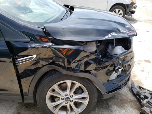 Photo 9 from auction – 2018 FORD ESCAPE SE with VIN 1FMCU9GD6JUB80850