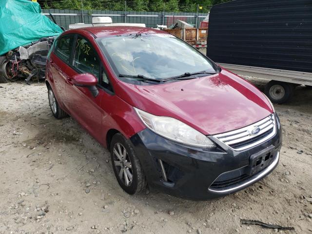 FORD FIESTA SE 2011 with VIN 3FADP4EJ6BM118498 - Photo from auction