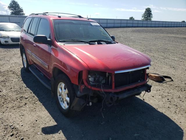 GMC ENVOY 2004 with VIN 1GKDT13SX42442908 - Photo from auction