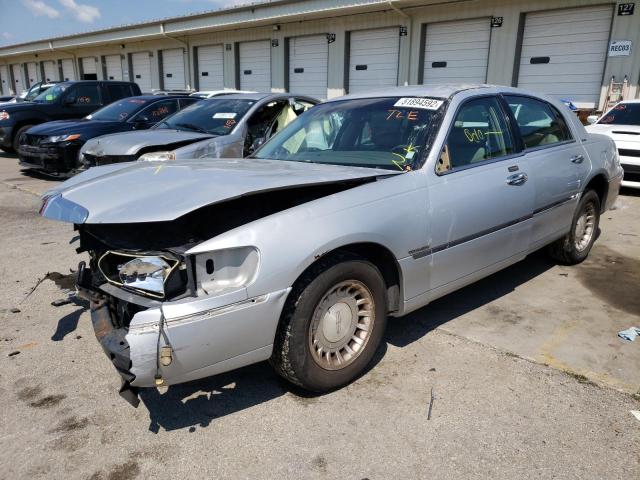 Photo 2 from auction – 2001 LINCOLN TOWN CAR E with VIN 1LNHM81W21Y672357