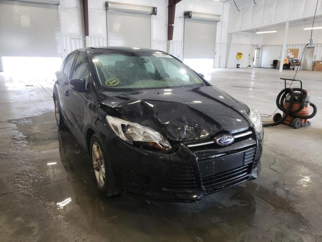 FORD FOCUS SE 2014 with VIN 1FADP3F28EL197986 - Photo from auction
