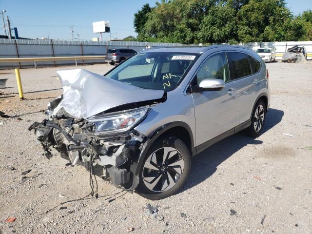 Photo 2 from auction – 2016 HONDA CR-V TOURI with VIN 5J6RM4H99GL020448