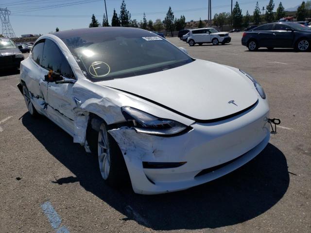 TESLA MODEL 3 2018 with VIN 5YJ3E1EA5JF050398 - Photo from auction