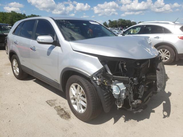 KIA SORENTO LX 2015 with VIN 5XYKTCA68FG611305 - Photo from auction