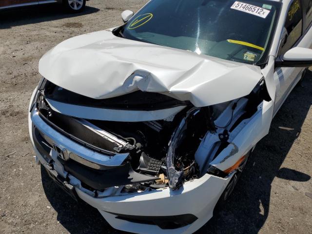 Photo 9 from auction – 2018 HONDA CIVIC EX with VIN JHMFC1F30JX022564