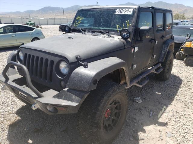 Photo 2 from auction – 2014 JEEP WRANGLER U with VIN 1C4BJWFG4EL100489