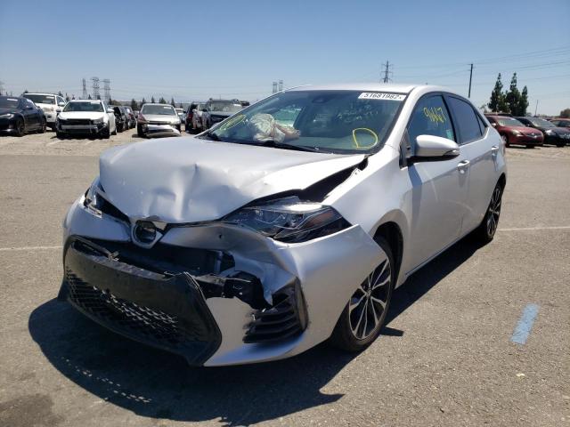 Photo 2 from auction – 2017 TOYOTA COROLLA L with VIN 5YFBURHE5HP724267