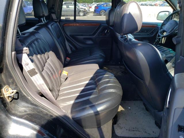 Photo 6 from auction – 1999 JEEP UK with VIN 1J4GW68N3XC714580
